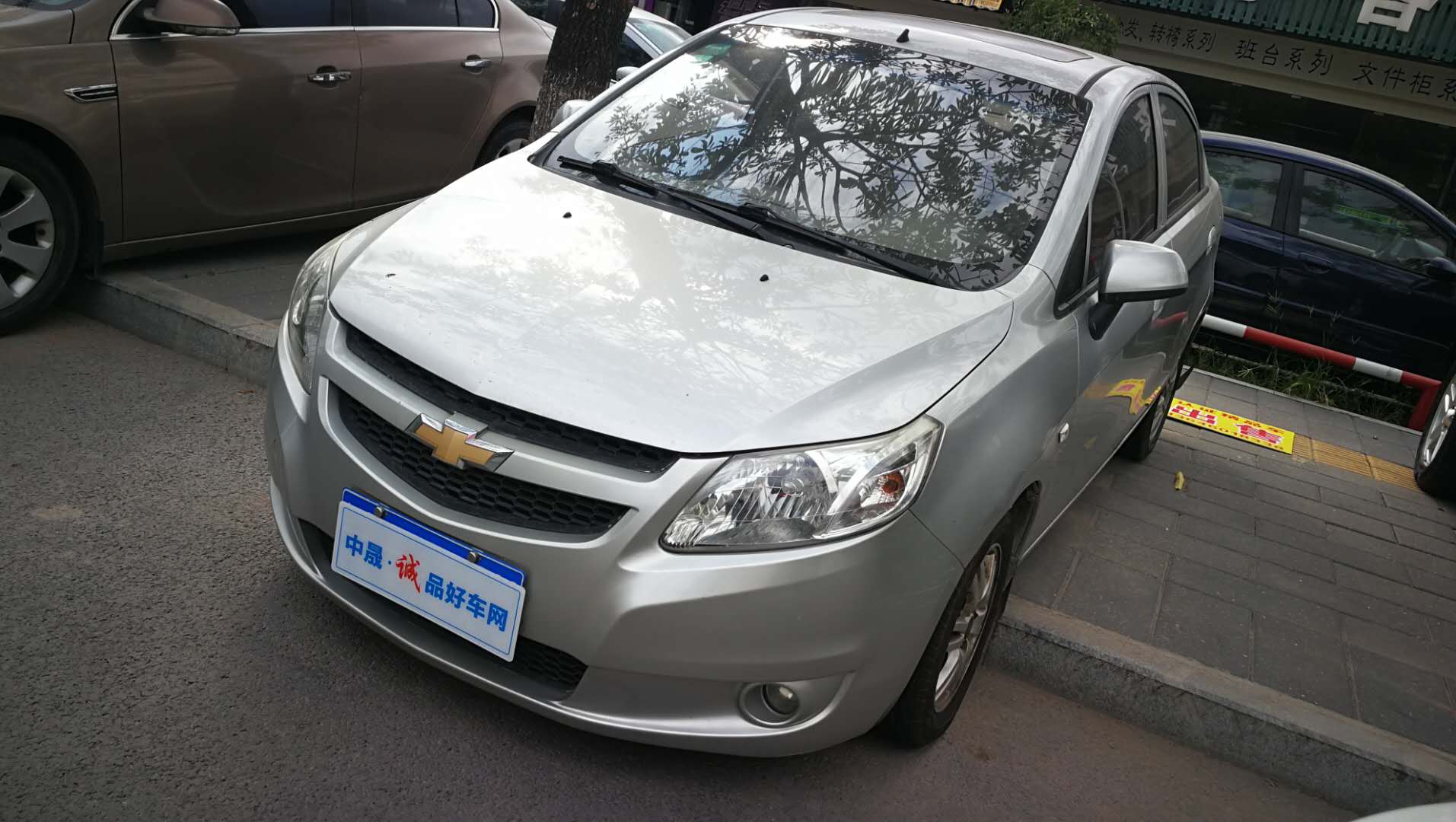 2011款 赛欧三厢 1.4L EMT 幸福版